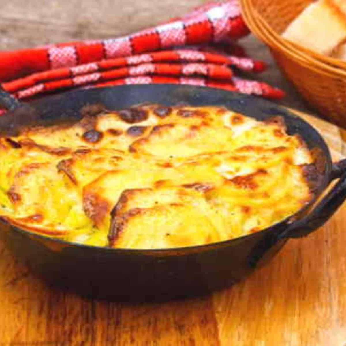 A traditional gratin dauphinois is a creamy bowl of potato, garlic, and cream. gratin-dauphinois
