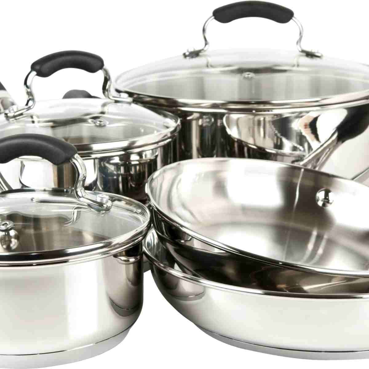 Silver set of three pots with glass lids and black handles and two frying pans.