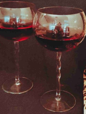 Two glasses of red wine.