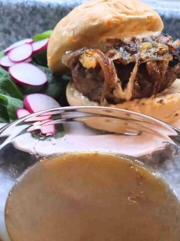 Cheeseburger enhanced with homemade au jus.