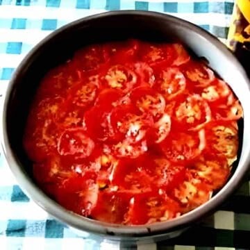 A vegetable tian made with eggplant, zucchini, tomato and potato.