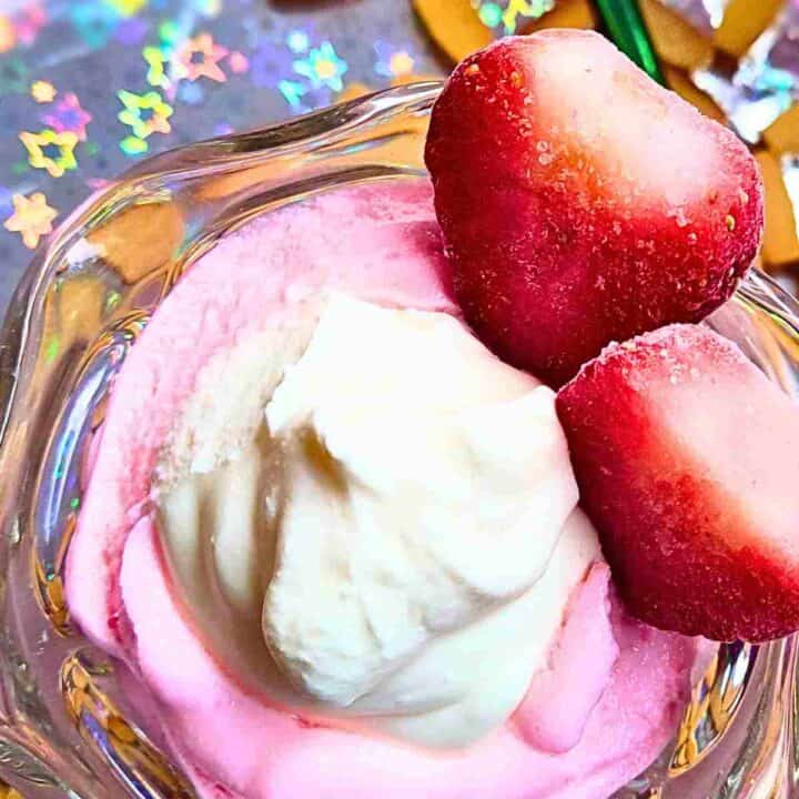 Rich and decadent creme fraiche garnishes strawberry mousse.