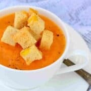 French pumpkin soup with cheesy croutons and grated pepper.