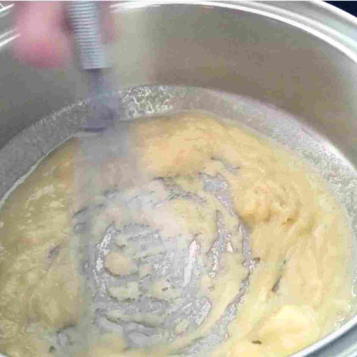 Whisk flour into melted butter quickly until it is all incorporated and smooth.