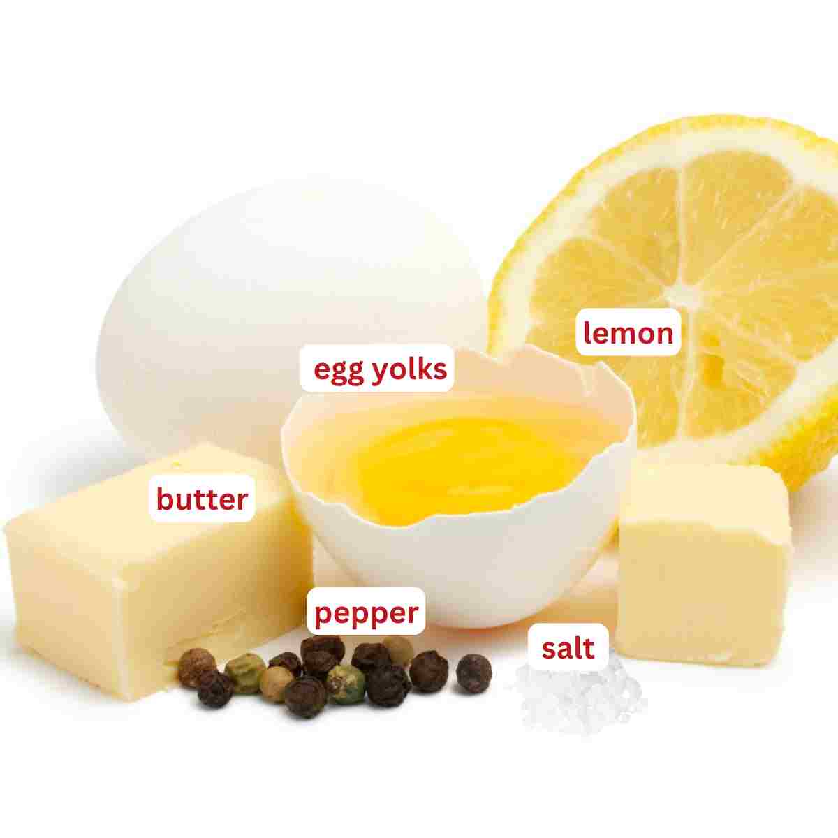 Ingredient photo for hollandaise with lemon, egg yolks, butter, salt and pepper.