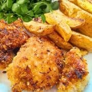 A Mediterranean grilled chicken breast with a golden crust.