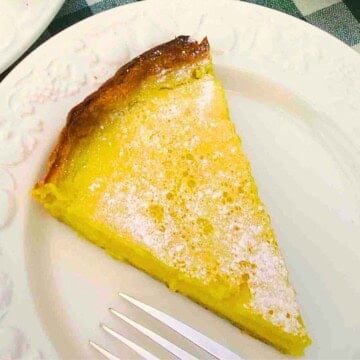 Easy lemon tart recipe with shortcrust pastry and fresh lemon custard filling.