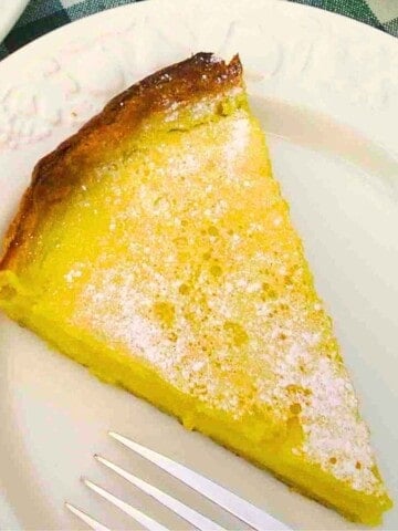 Easy lemon tart recipe with shortcrust pastry and fresh lemon custard filling.