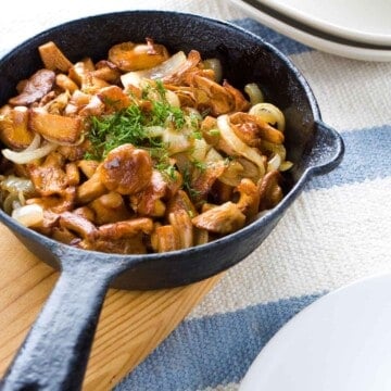 Cooked Chanterelle mushrooms ready to serve and on the table.