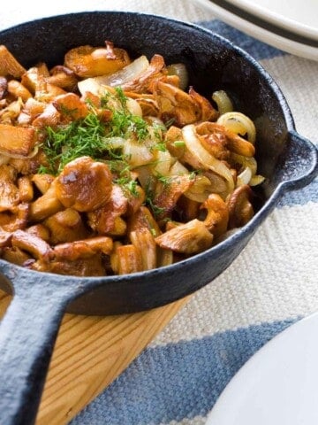 Cooked Chanterelle mushrooms ready to serve and on the table.