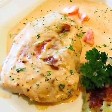 Pork chops smothered in a creamy tomato sauce.