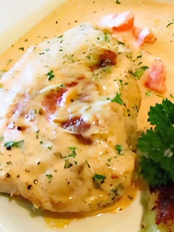 Pork chops smothered in a creamy tomato sauce.