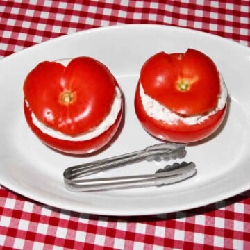 Seafood stuffed tomatoes for an appetizer table.