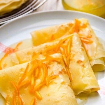 Crêpes Suzette is the classic French crêpe served with flaming orange sauce.