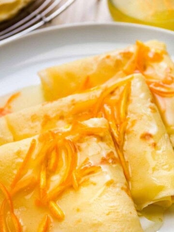 Crêpes Suzette is the classic French crêpe served with flaming orange sauce.